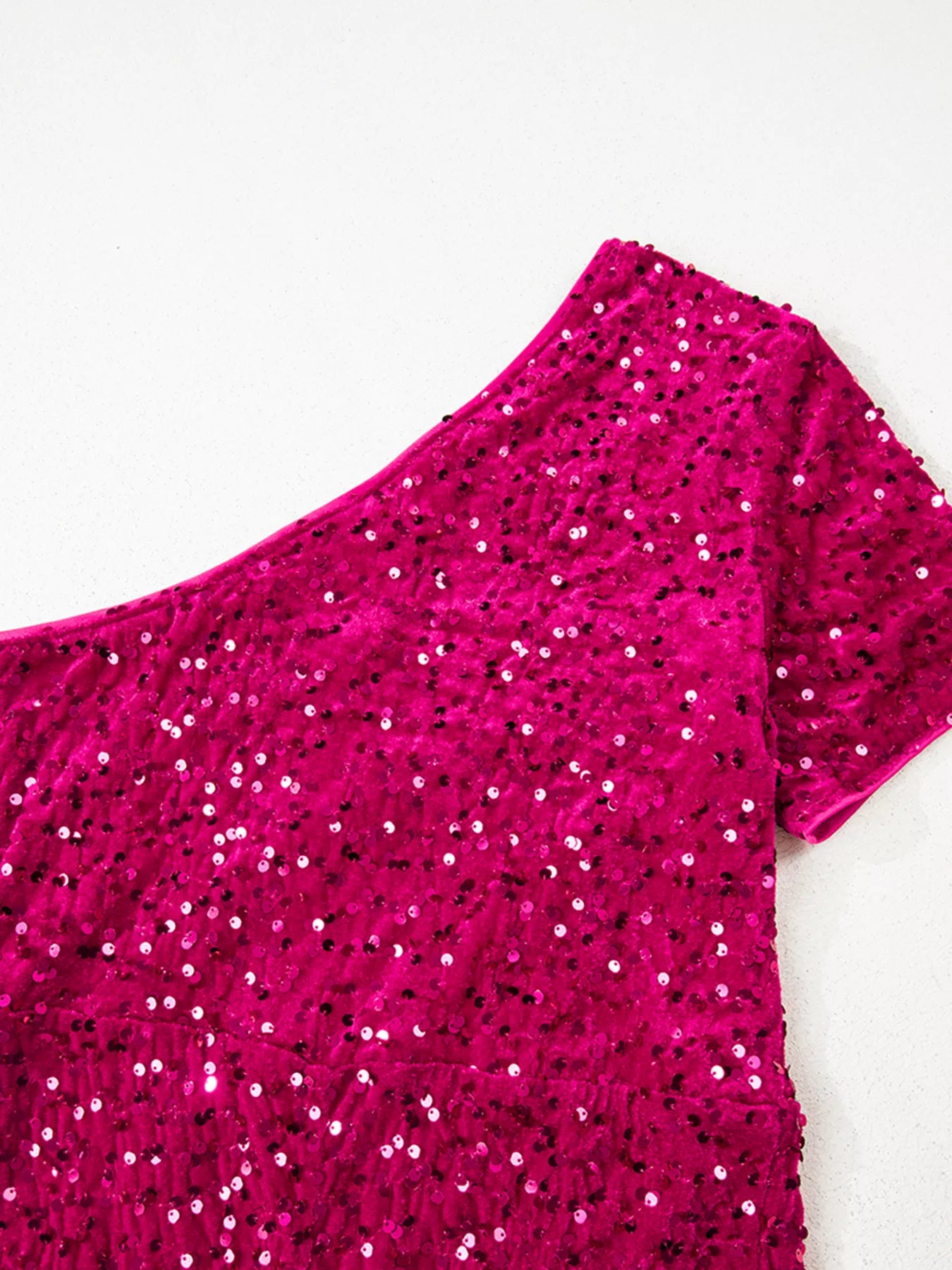 Sequin One-Shoulder Dress featuring vibrant pink sequins on a sleek silhouette, ideal for glamorous events.