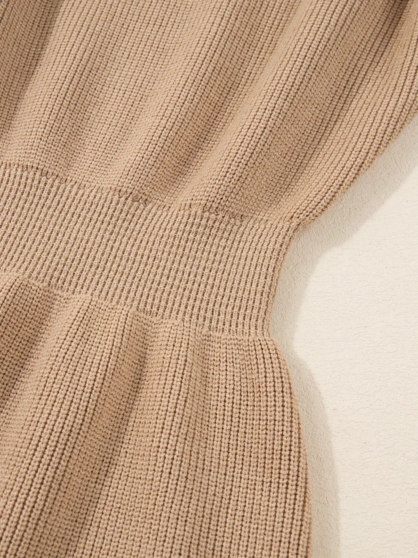 Close-up of Stylish Knit Sweater Dress for women showing the textured knit finish and flattering silhouette.