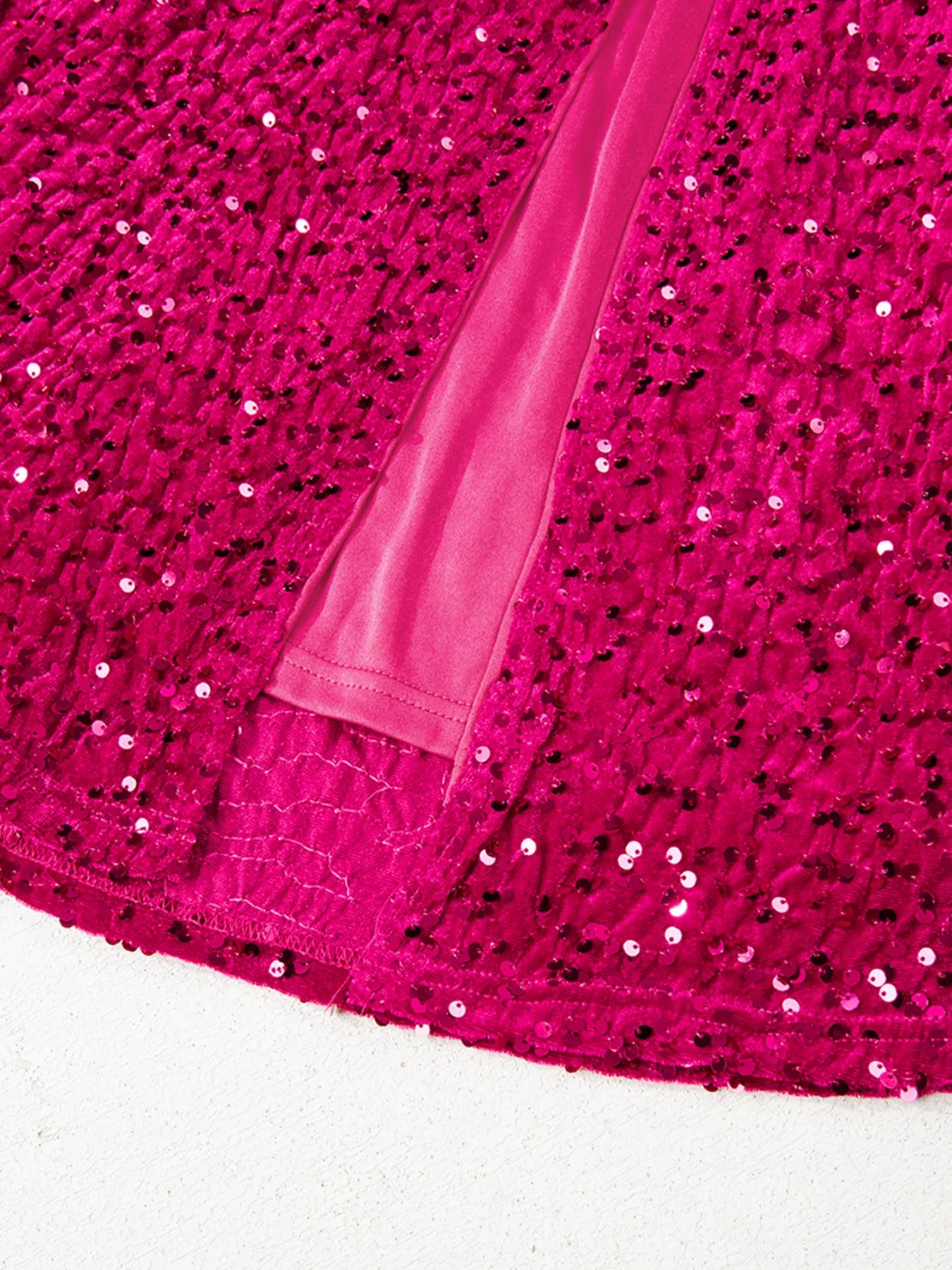 Sequin One-Shoulder Dress fabric detail showcasing shimmering sequins and high slit design for glamorous party wear.