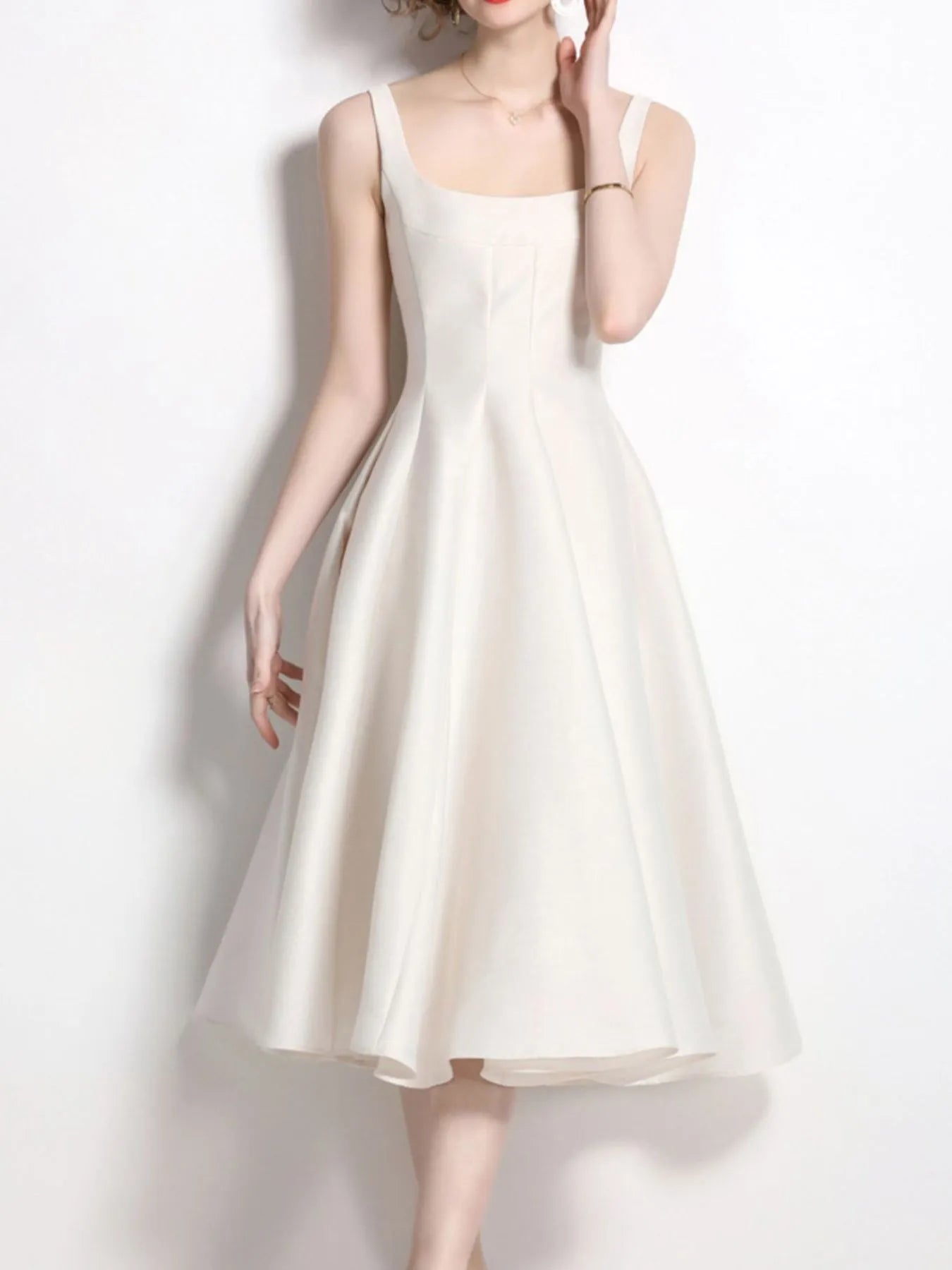 Elegant Polyester Evening Dress for Women in ivory white with a square neckline and flared midi skirt. Ideal for formal events and versatile styling.