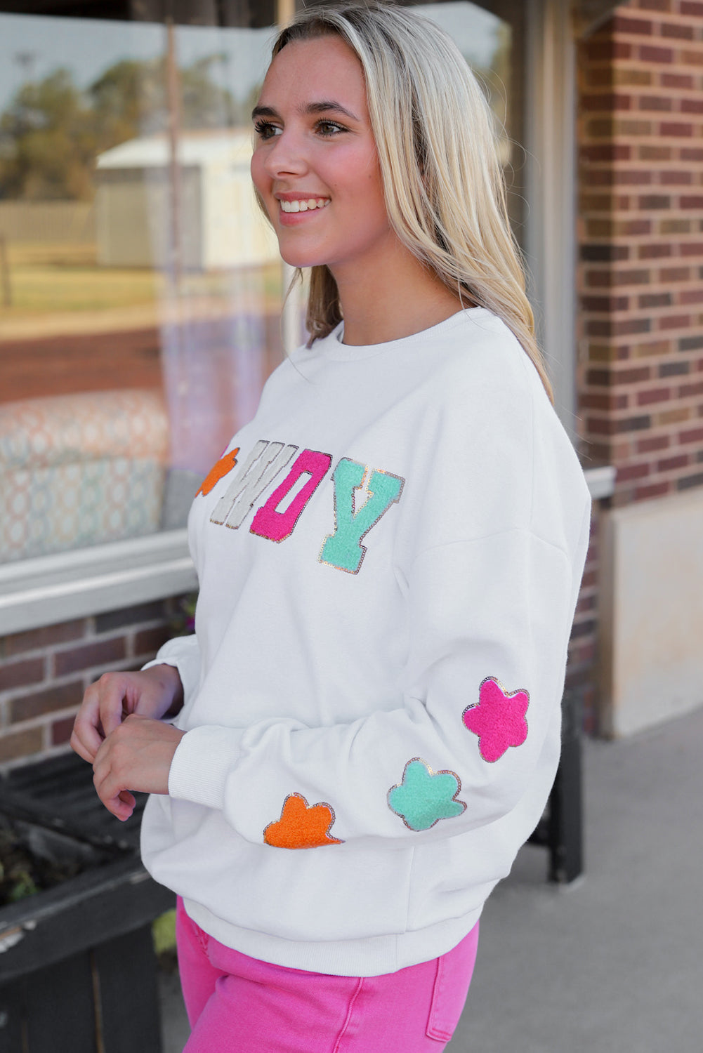 Howdy Graphic Sweatshirt with Star Sleeve Design