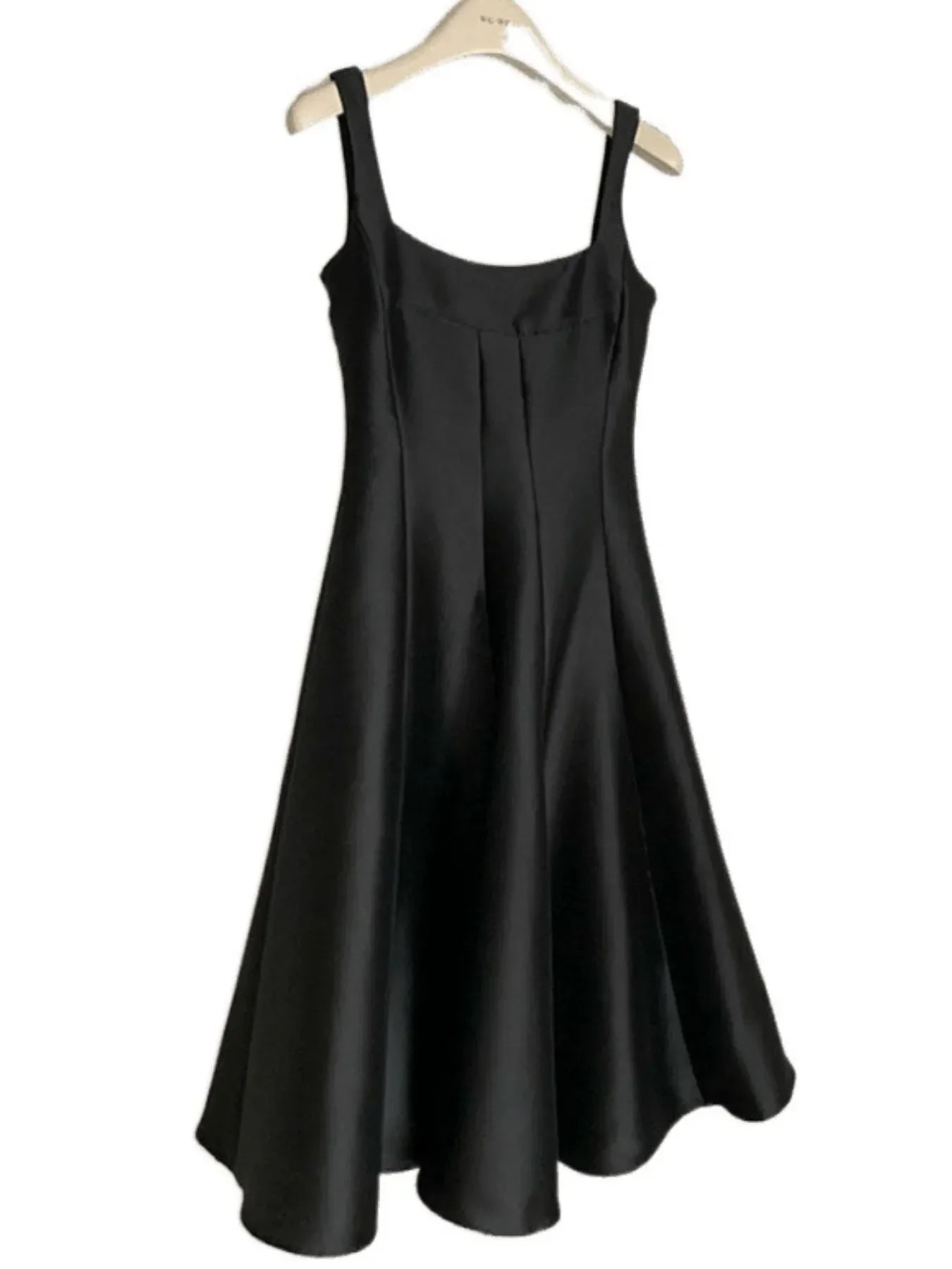 Elegant black Polyester Evening Dress for women with a flared skirt and adjustable straps.