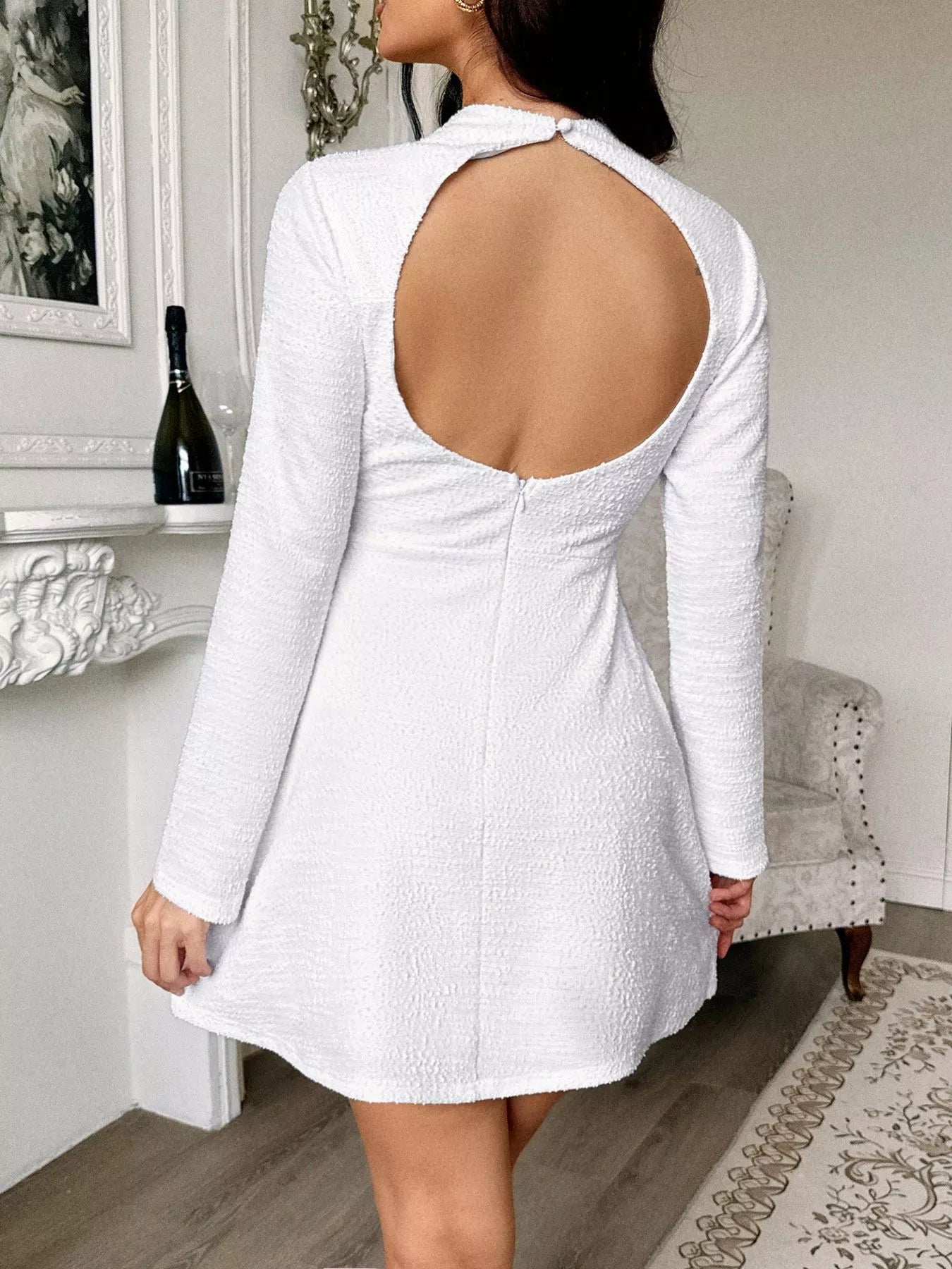  Sleek Cutout Back Long Sleeve Mini Dress Elegant Design